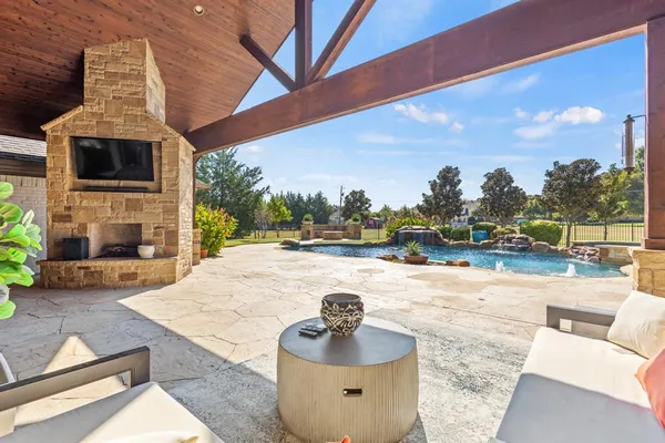 a cabinet in a kitchen and a refrigerator