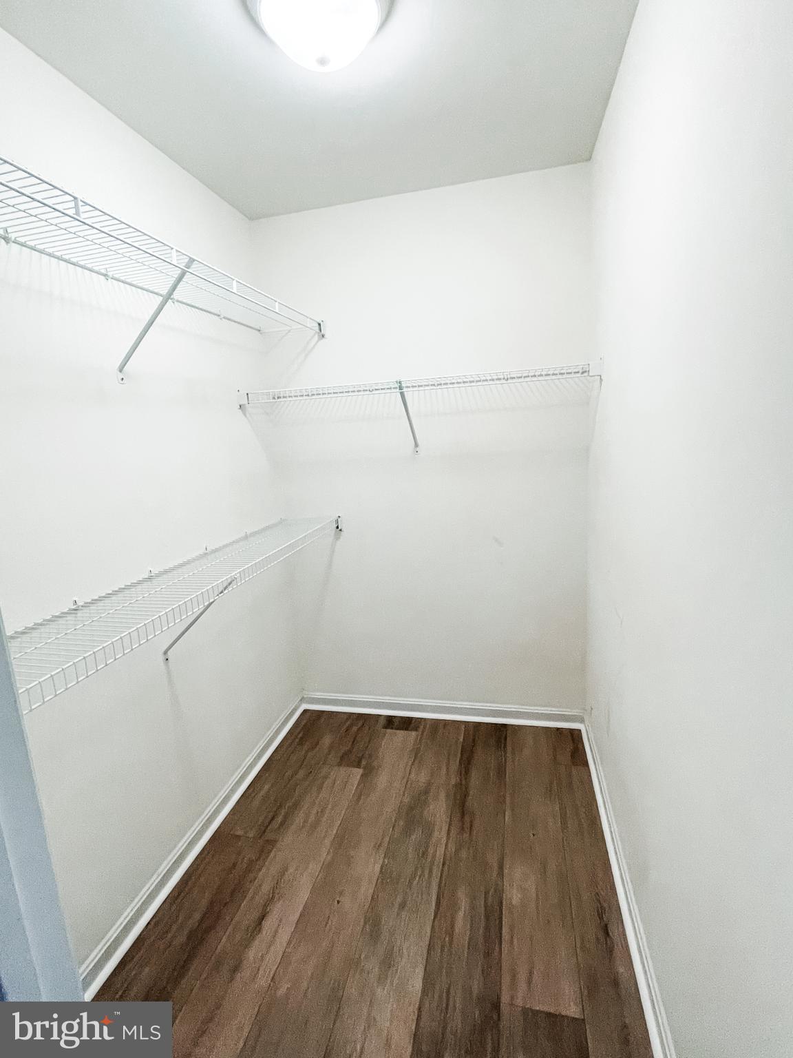 18162 White Tail Way St. Inigoes, MD 20684 - Photo 15 of 29 a view of a room with racks on the wall