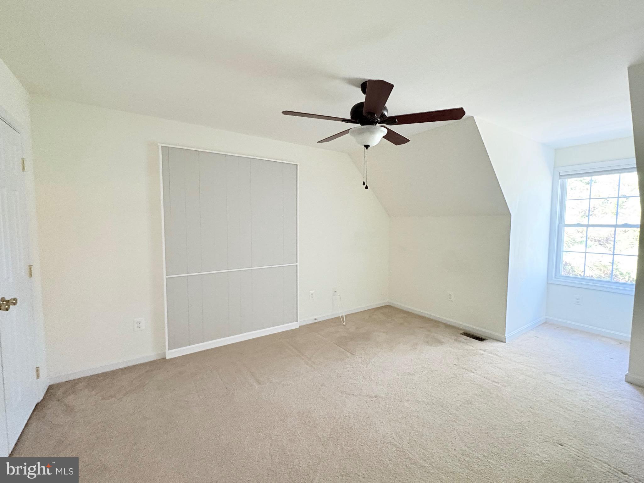 18162 White Tail Way St. Inigoes, MD 20684 - Photo 22 of 29 an empty room with a empty space and a ceiling fan