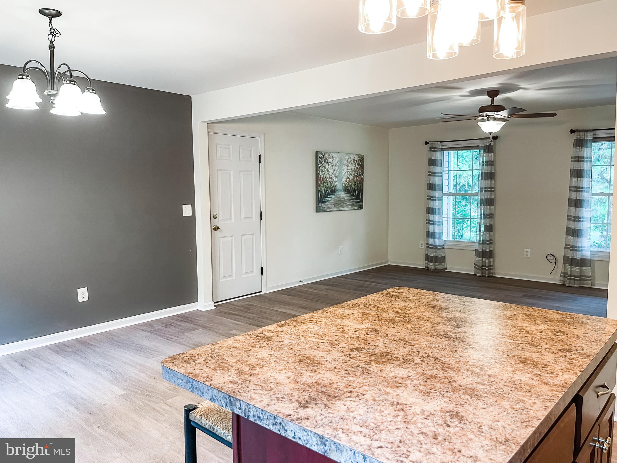 18162 White Tail Way St. Inigoes, MD 20684 - Photo 9 of 29 a view of an empty room and window