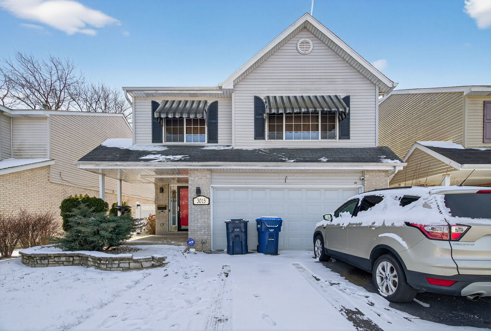 a car parked in front of a house