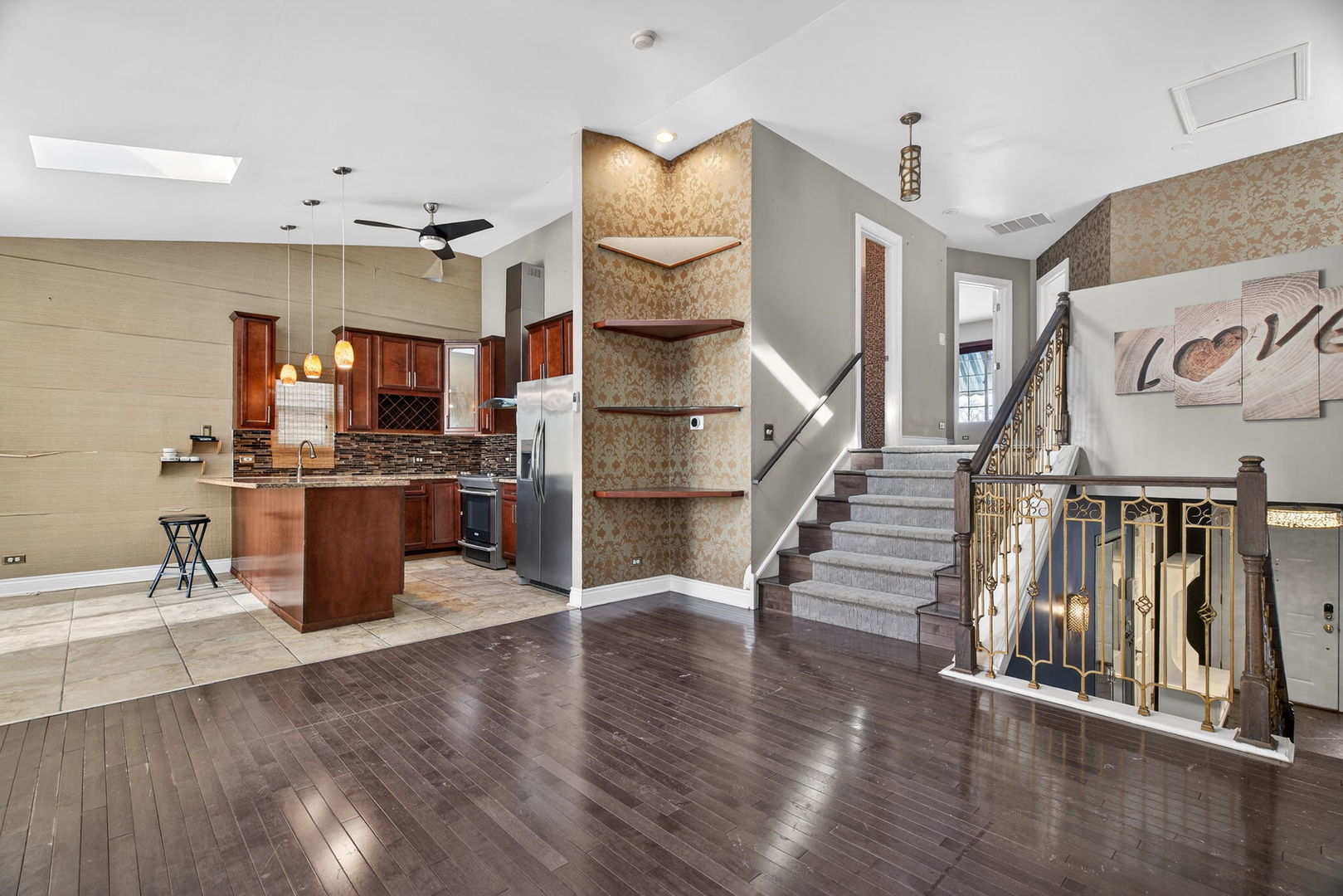 3015 140th Place Blue Island, IL 60406 - Photo 5 of 22 a kitchen with stainless steel appliances kitchen island granite countertop a refrigerator a stove and white cabinets with wooden floor