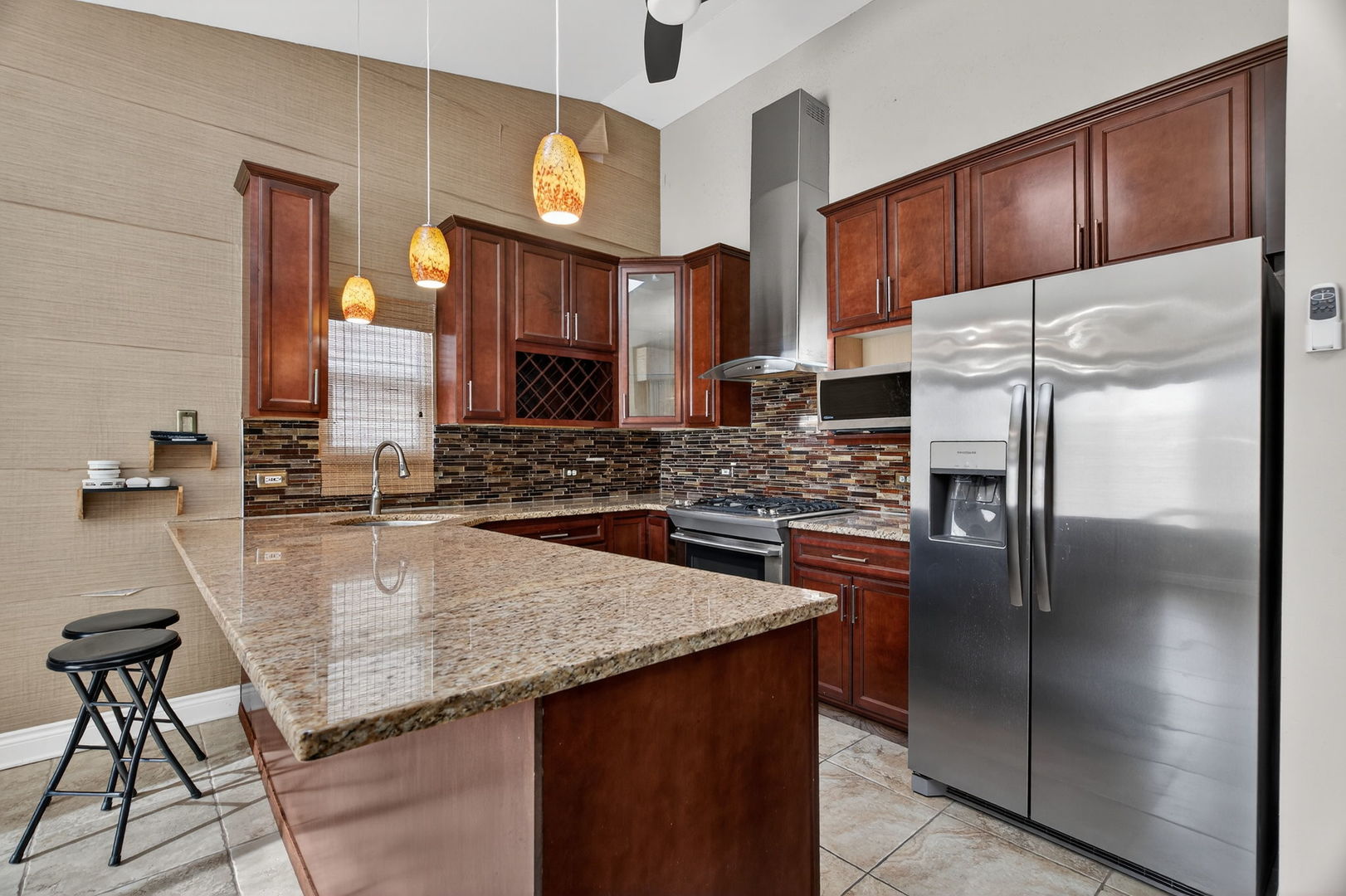 3015 140th Place Blue Island, IL 60406 - Photo 7 of 22 a kitchen with stainless steel appliances granite countertop a sink refrigerator and cabinets