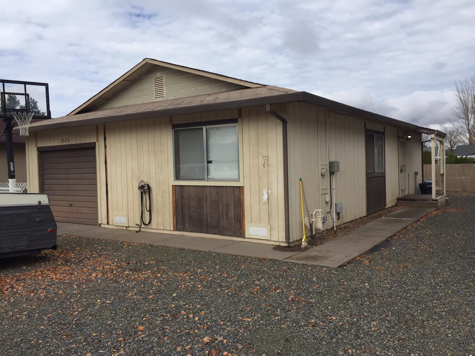 20678 Roff Way Burney, CA 96013 - Photo 1 of 12 a front view of a house
