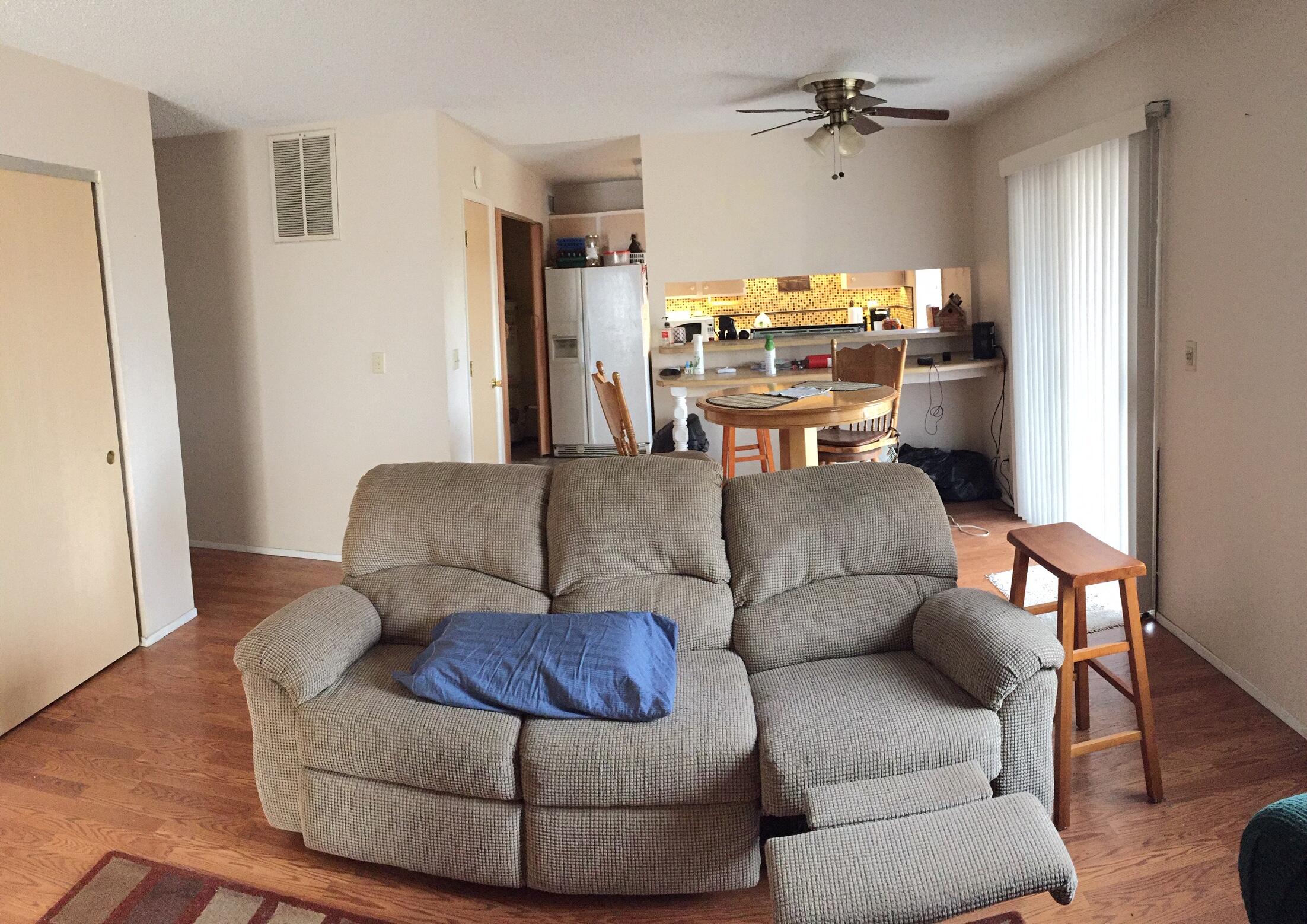 20678 Roff Way Burney, CA 96013 - Photo 4 of 12 a living room with furniture and a chandelier