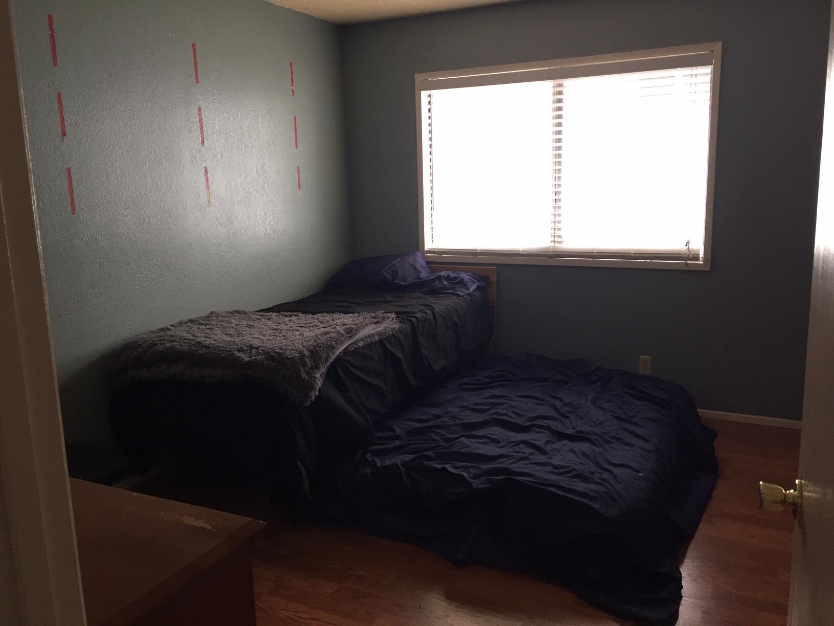 20678 Roff Way Burney, CA 96013 - Photo 9 of 12 a bed sitting in a bedroom next to a window