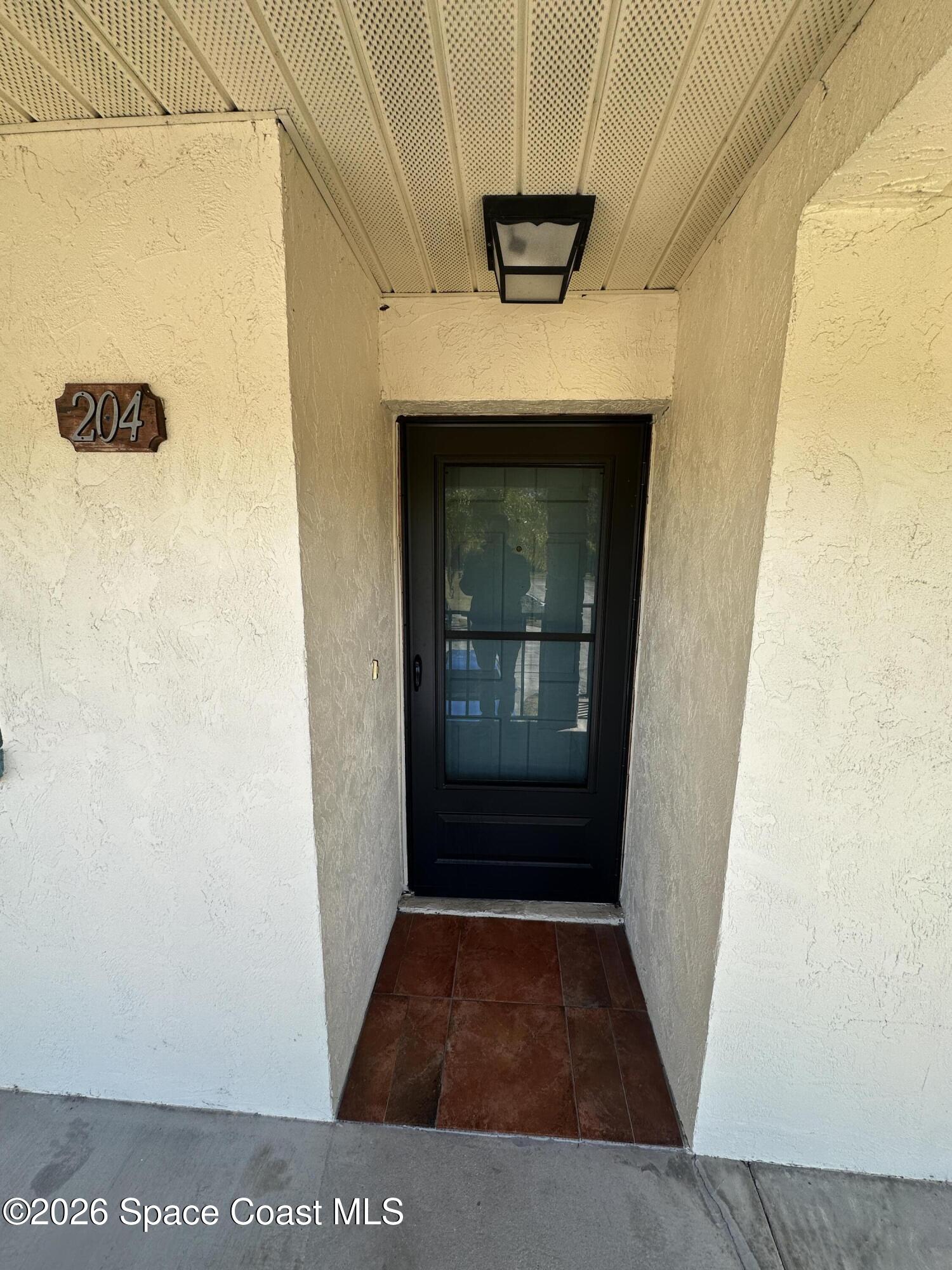 100 Canebreakers Drive, Unit 204 Cocoa, FL 32927 - Photo 2 of 25 IMG_9111 2