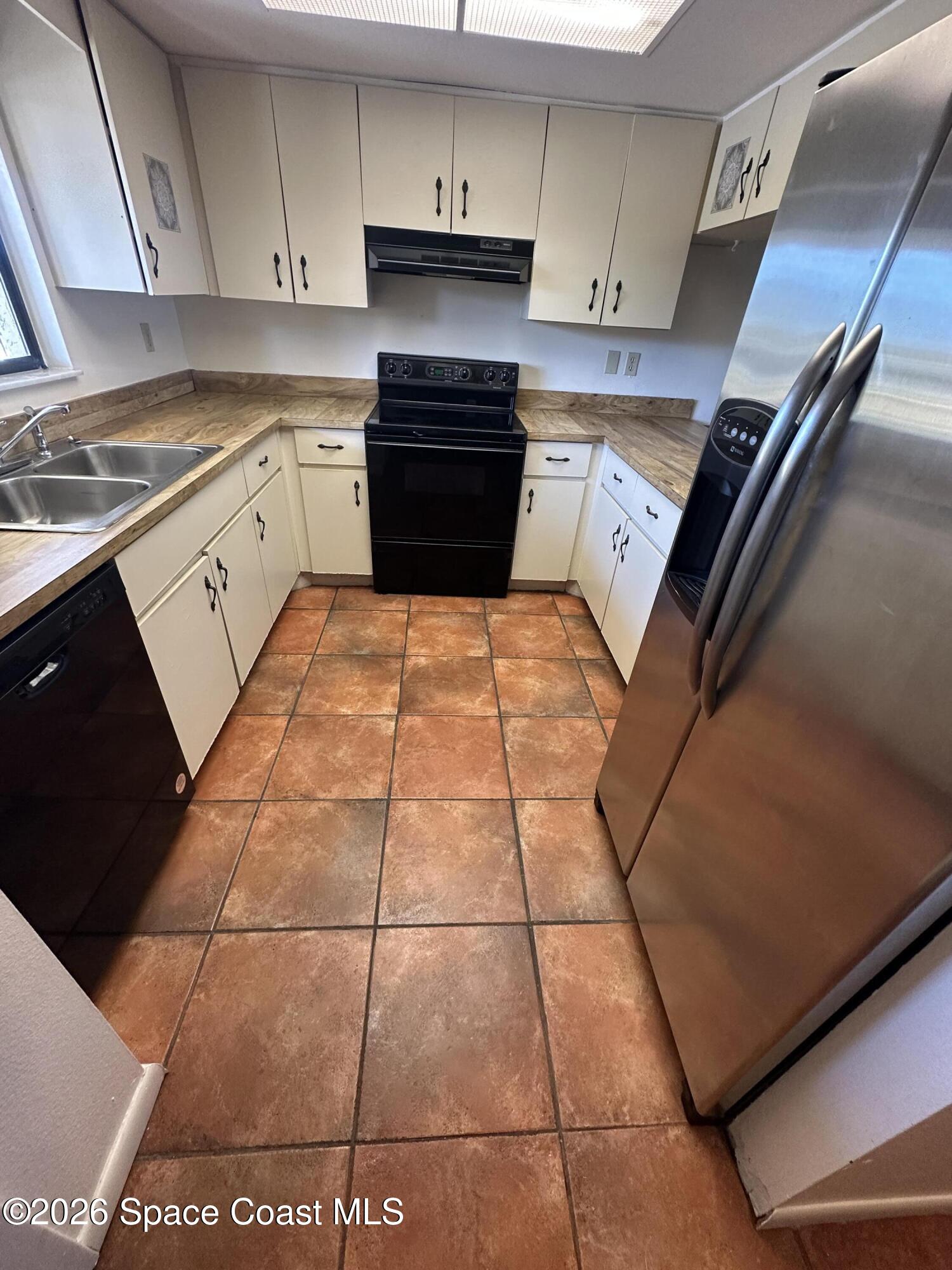 100 Canebreakers Drive, Unit 204 Cocoa, FL 32927 - Photo 4 of 25 IMG_9113 2