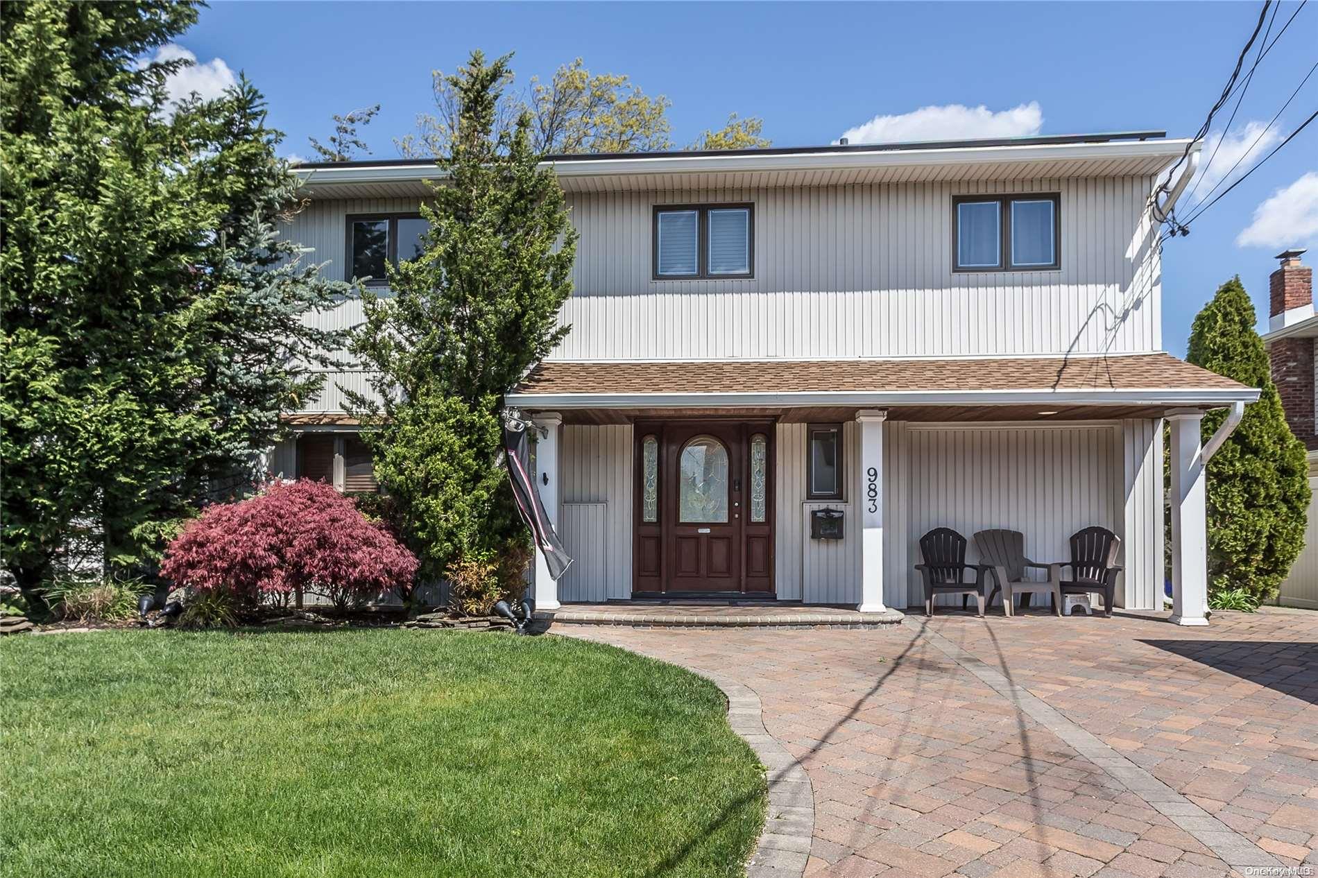 a house view with a garden space
