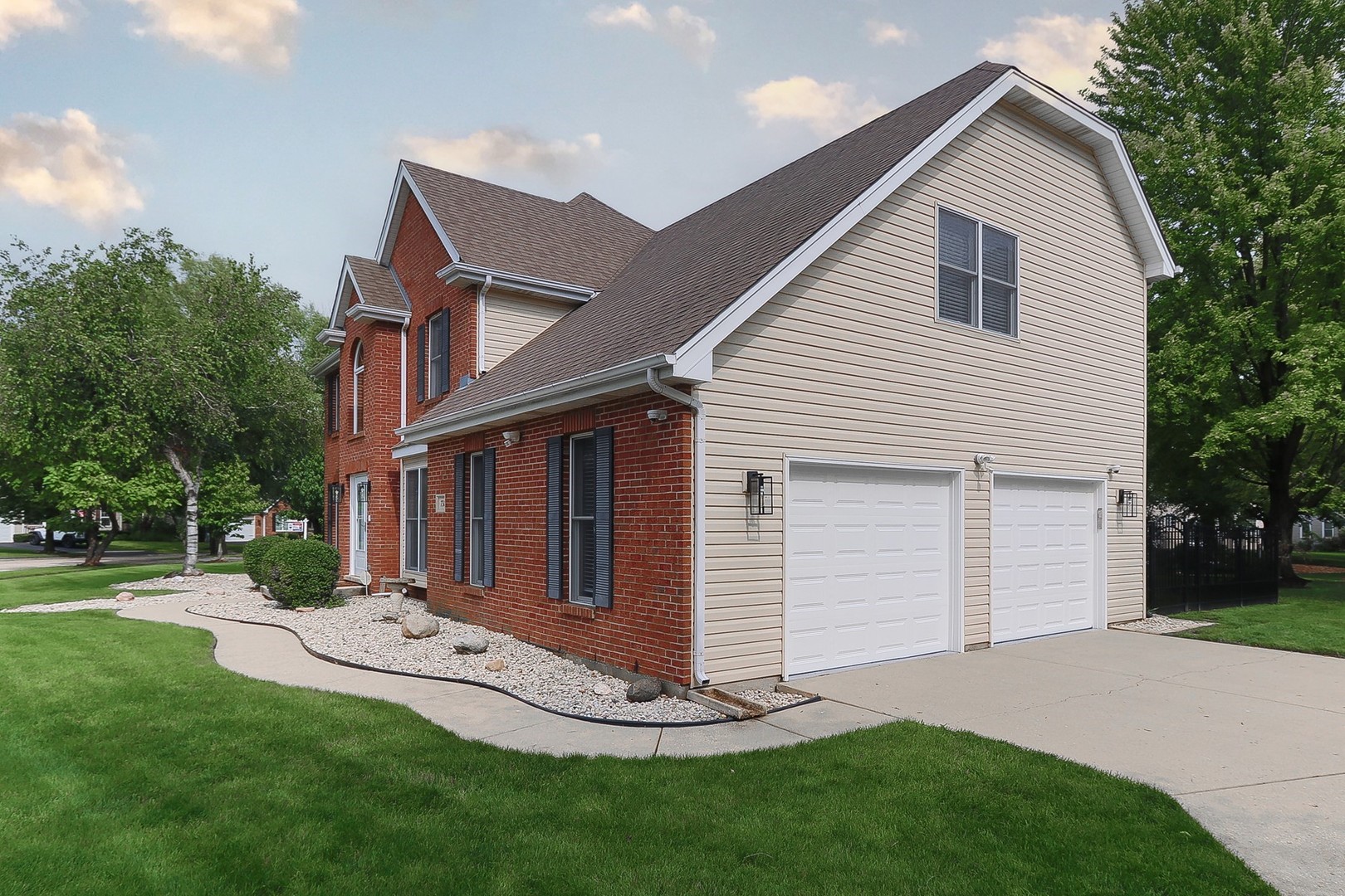 731 Laurel Lane Cary, IL 60013 - Photo 4 of 6 a front view of house with yard and green space