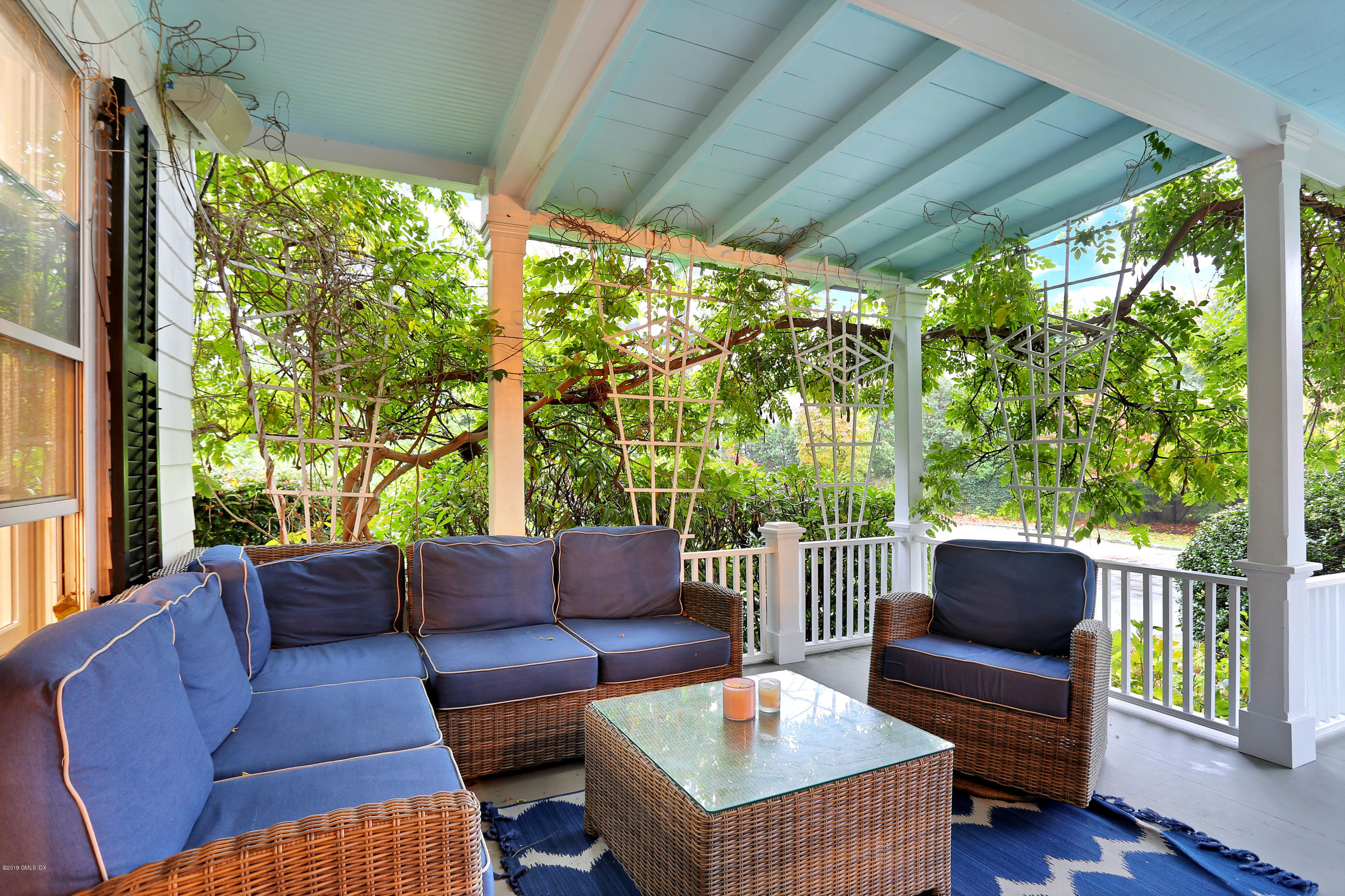 20 Lockwood Road Riverside, CT 06878 - Photo 12 of 27 a balcony with furniture and a potted plant