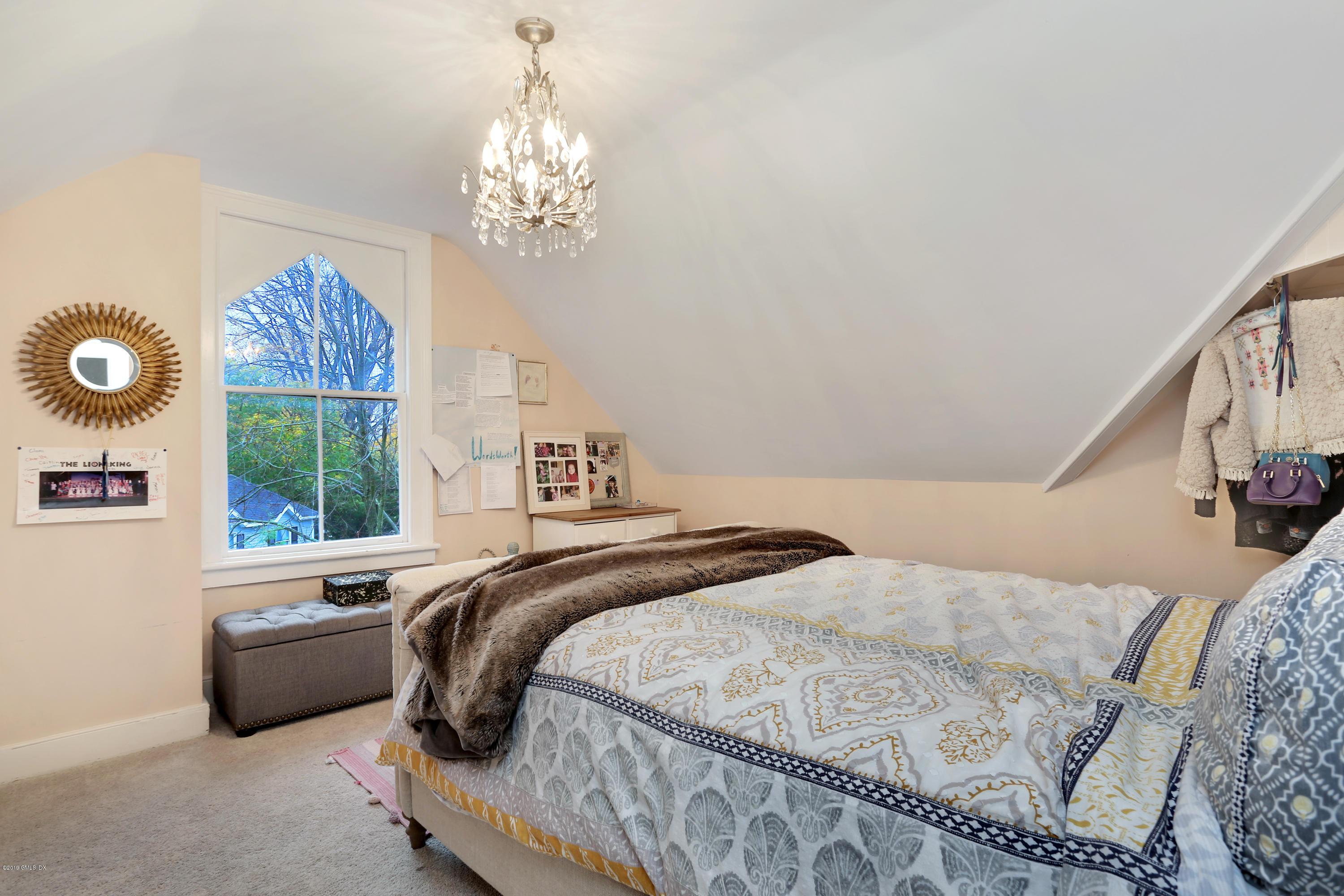 20 Lockwood Road Riverside, CT 06878 - Photo 23 of 27 a bedroom with a bed and a window