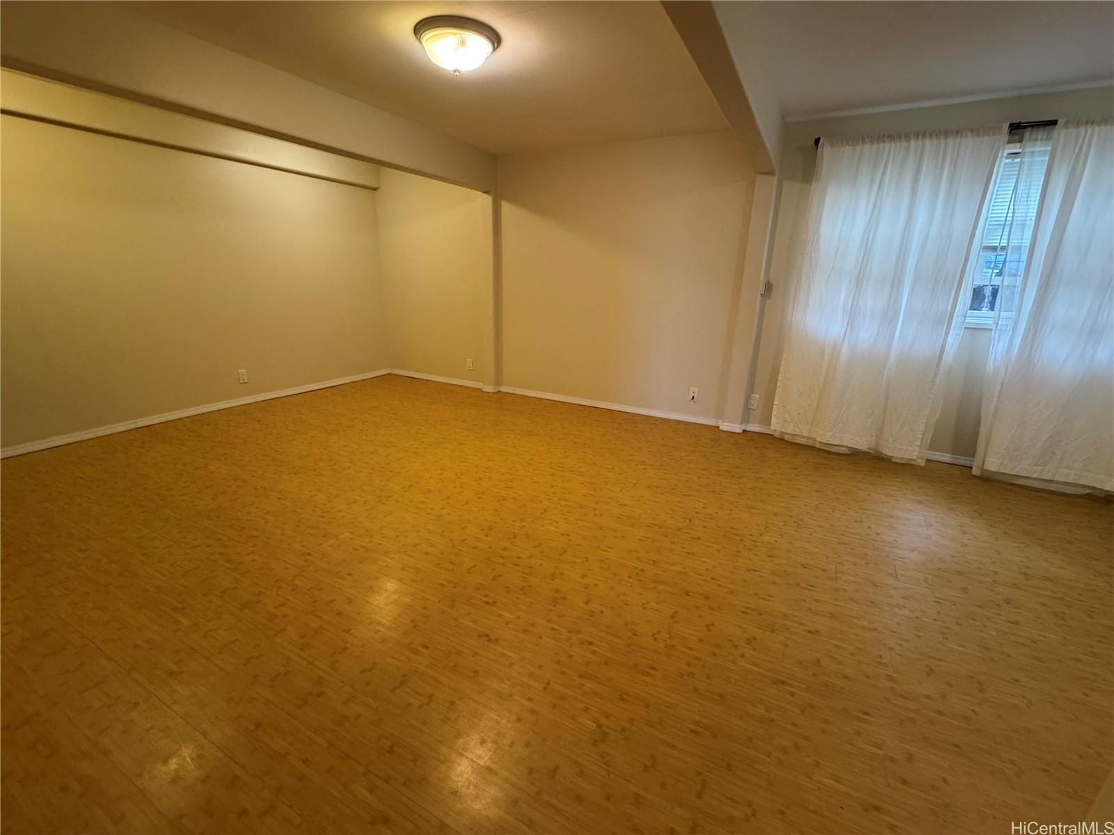 320 Hao Street Honolulu, HI 96821 - Photo 9 of 15 an empty room with a door