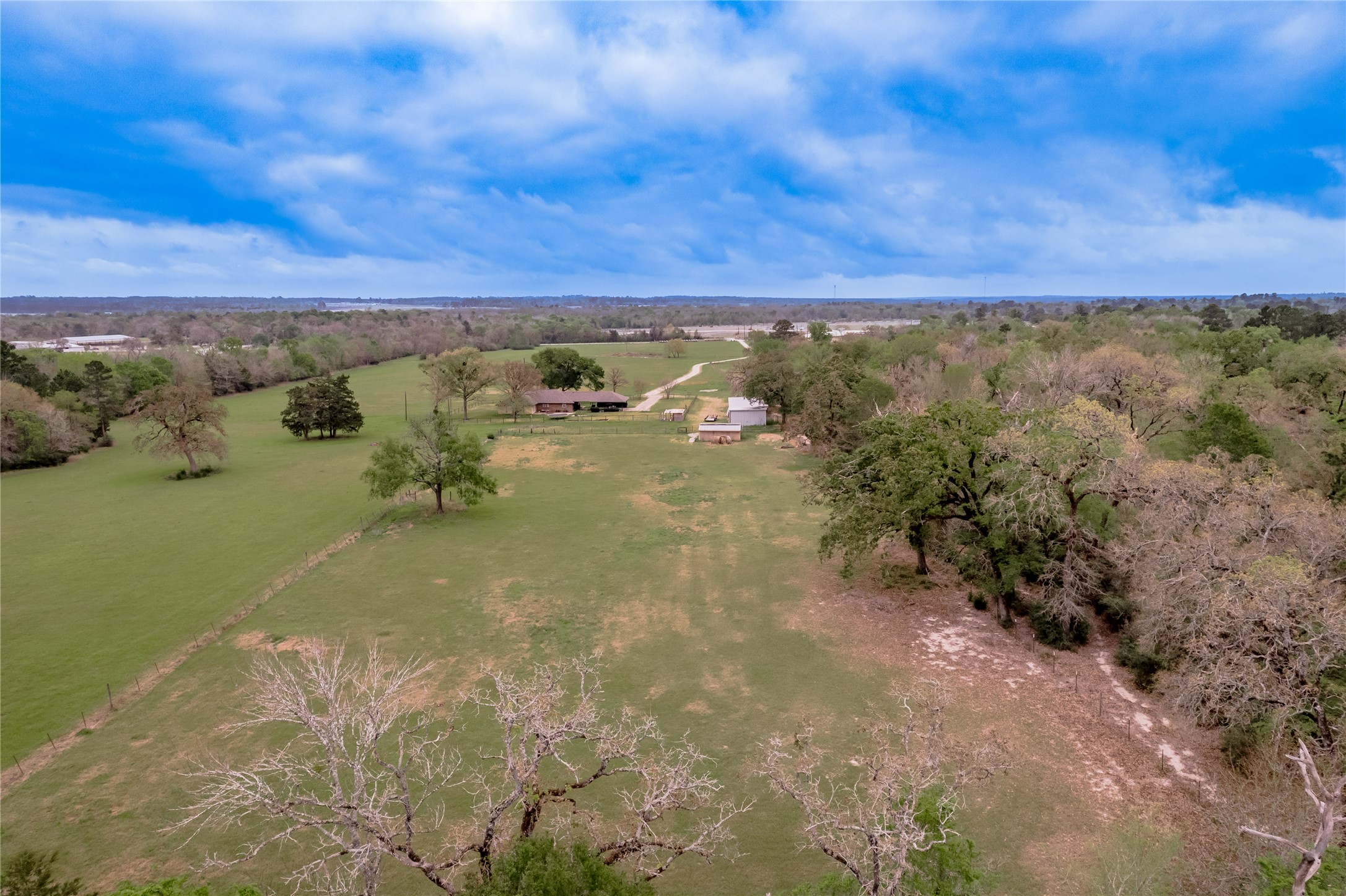 758 Wire Road Huntsville, TX 77320 - Photo 35 of 44 a view of a lake with a mountain in the background