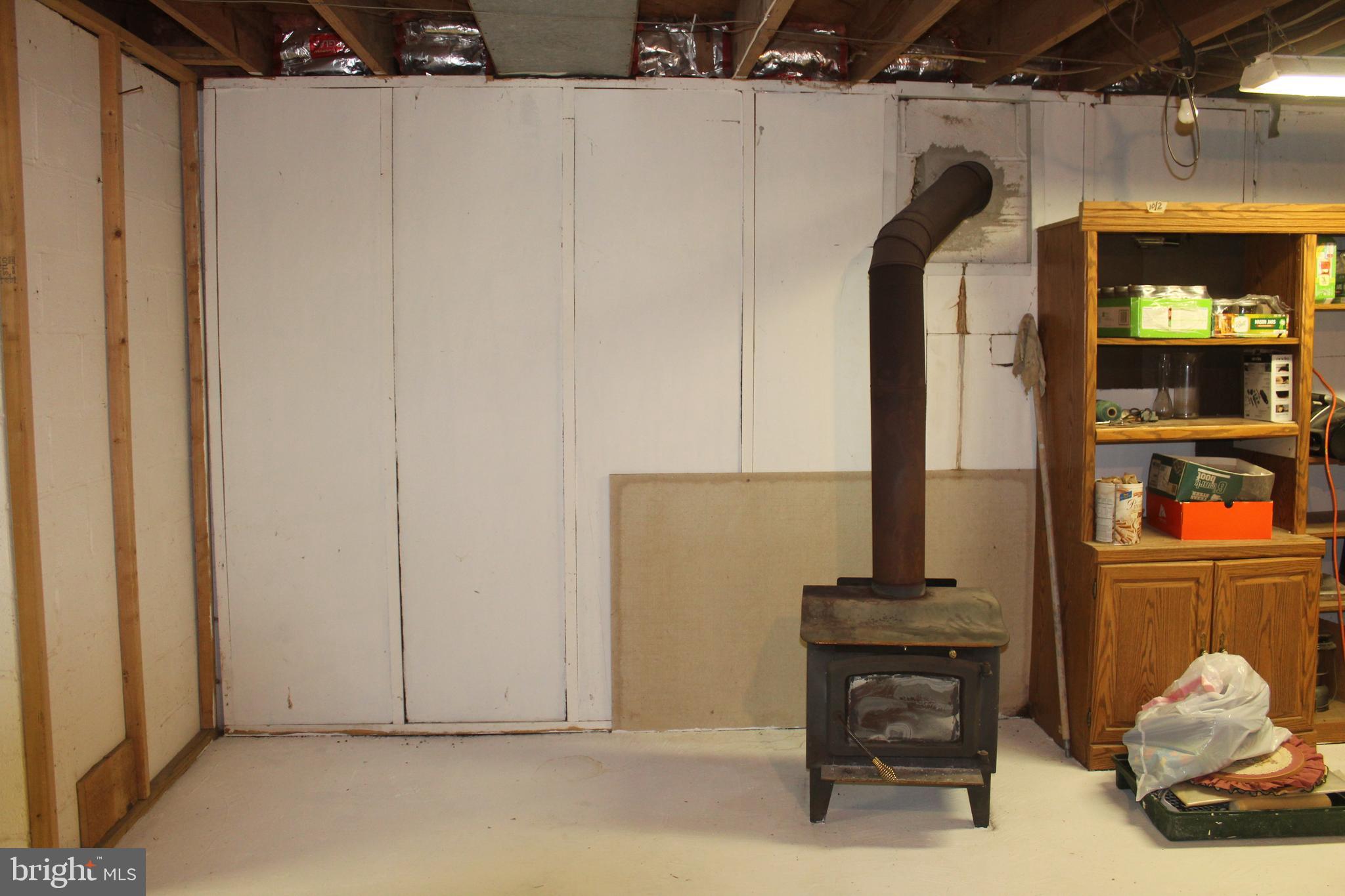 529 Poole Road Westminster, MD 21157 - Photo 96 of 110 downstairs woodstove
