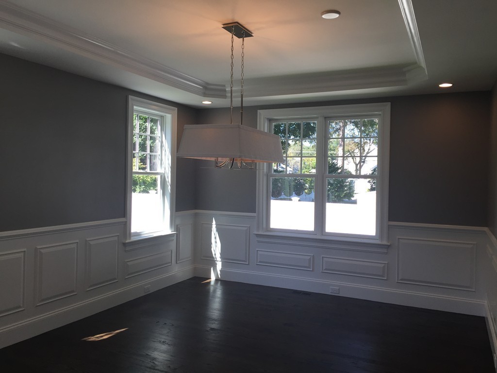 5 Thomas Road Wellesley, MA 02482 - Photo 14 of 29 a view of an empty room with wooden floor and a window