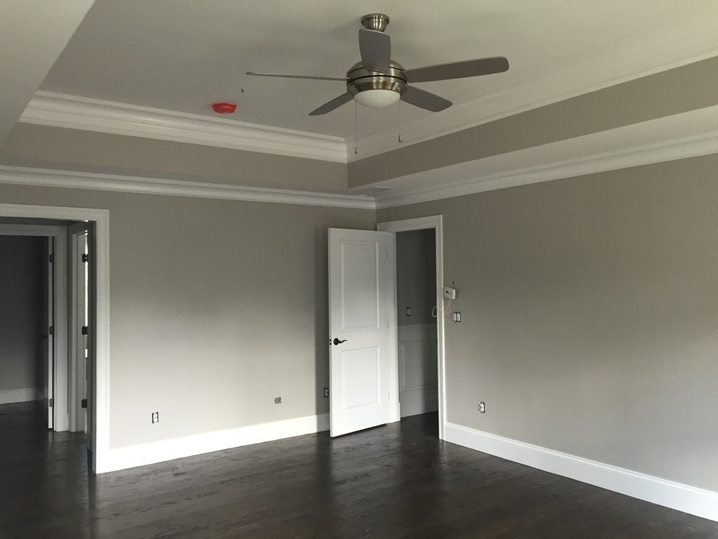 5 Thomas Road Wellesley, MA 02482 - Photo 17 of 29 a view of an empty room with wooden floor