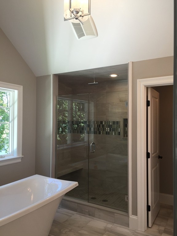 5 Thomas Road Wellesley, MA 02482 - Photo 19 of 29 a bathroom with a bathtub and shower