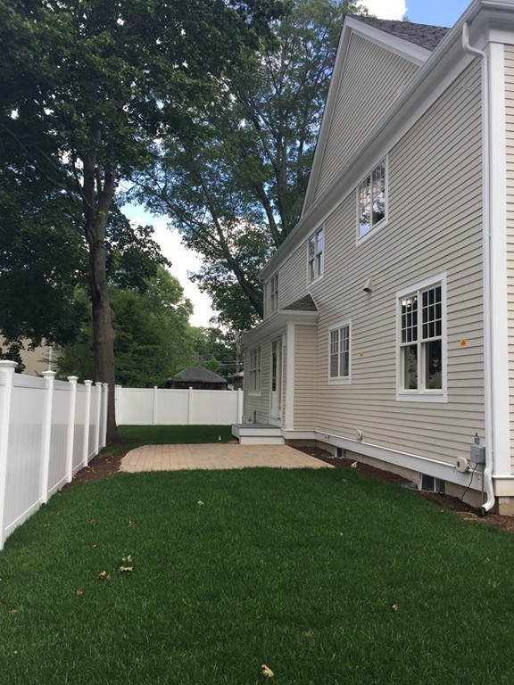 5 Thomas Road Wellesley, MA 02482 - Photo 4 of 29 a front view of house with yard and green space