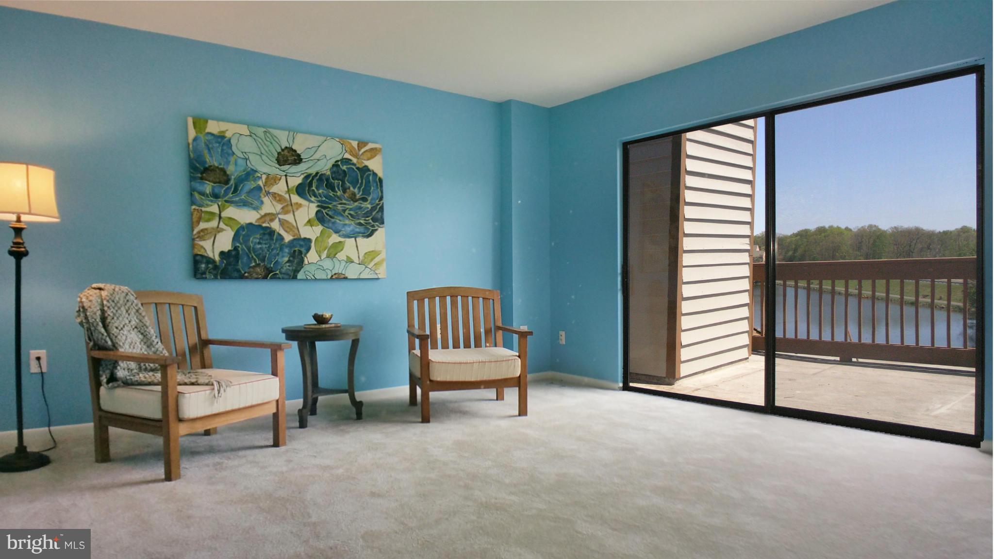 11204 Lagoon Lane Reston, VA 20191 - Photo 21 of 30 a living room with furniture and a gate