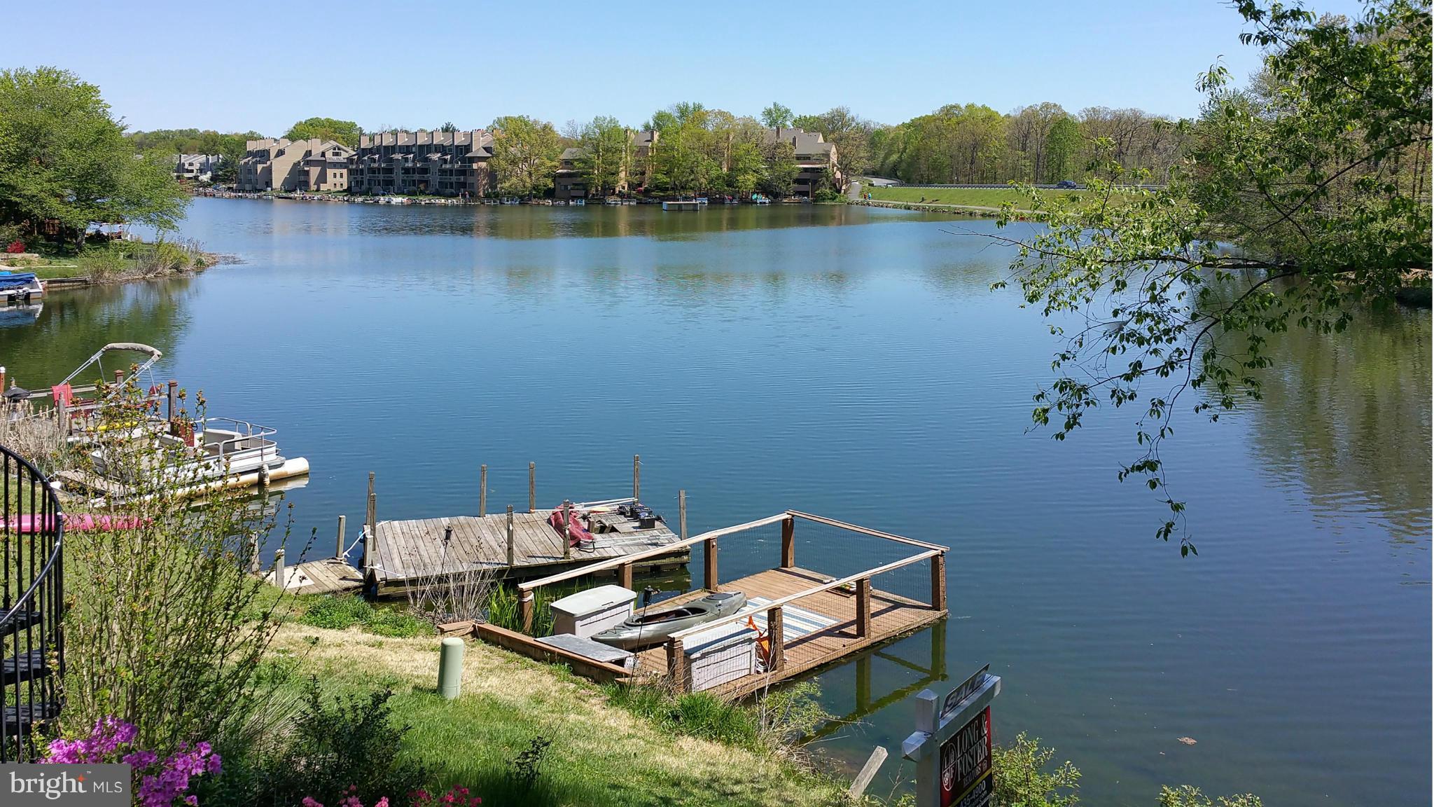 11204 Lagoon Lane Reston, VA 20191 - Photo 4 of 30 a view of a lake with a mountain view