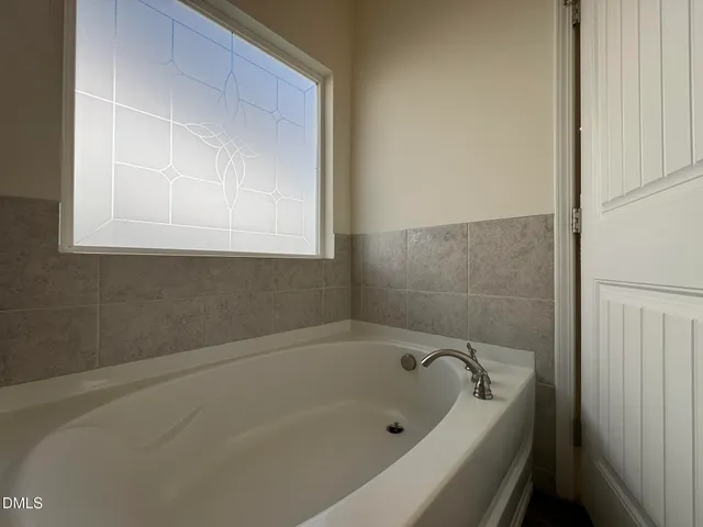 a bathroom with a tub