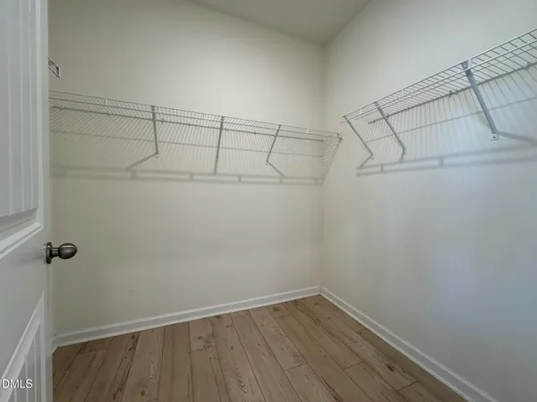 a view of a room with racks on the wall