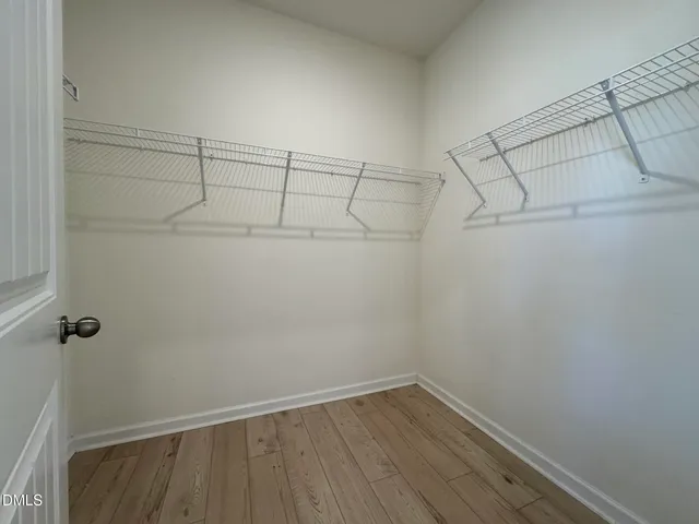 a view of a room with racks on the wall