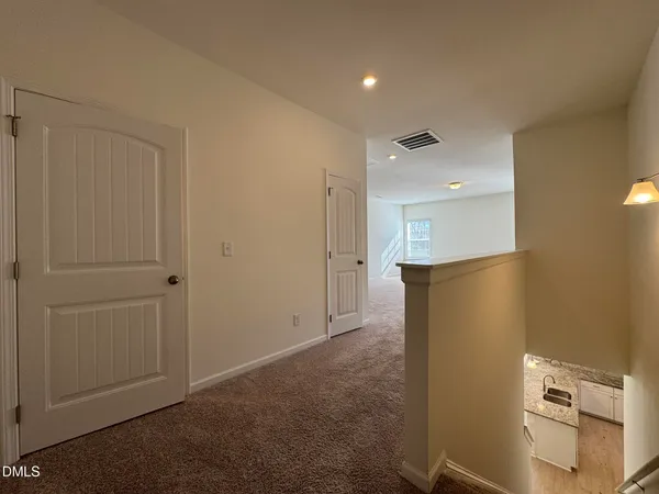 a view of a big room with wooden cabinets