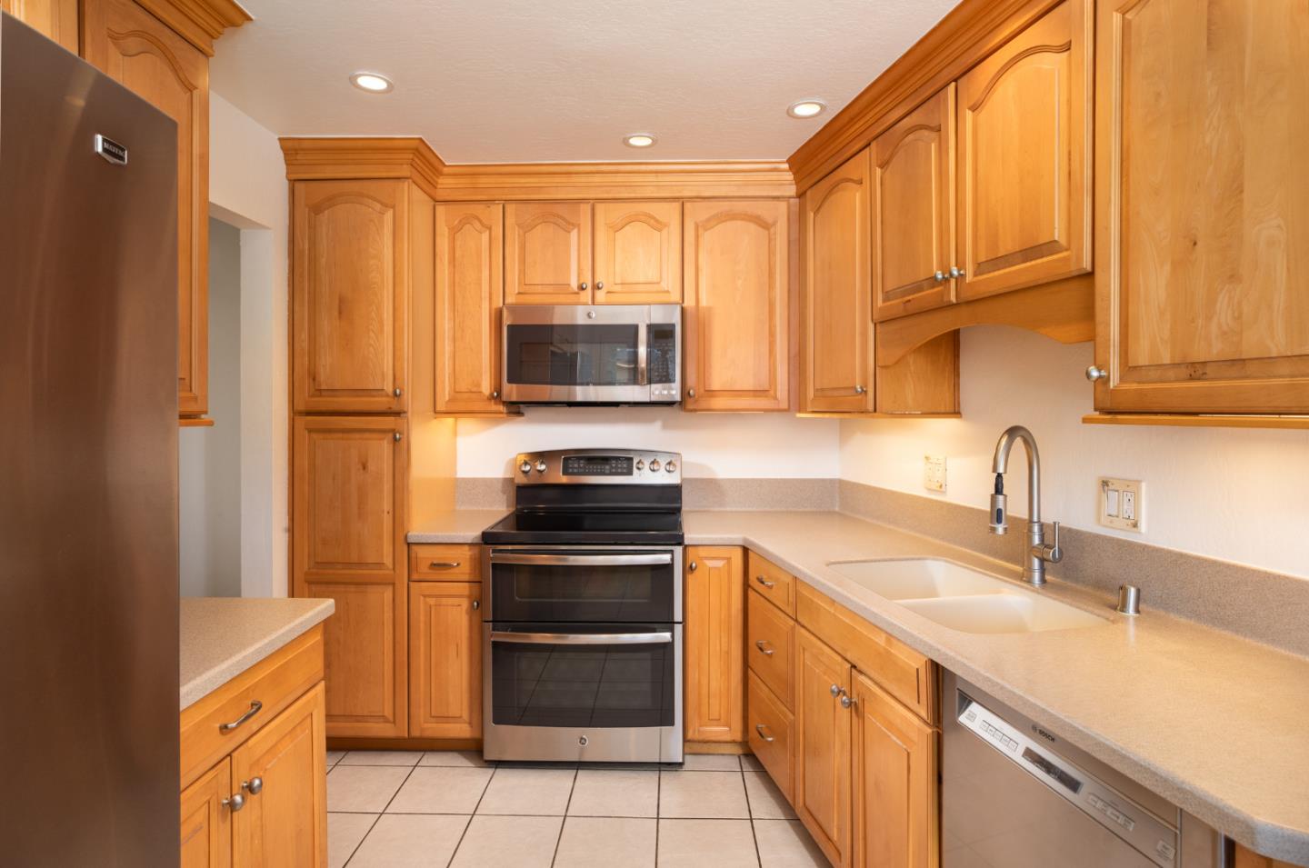 1937 Adelaide Way San Jose, CA 95124 - Photo 10 of 33 a kitchen with a sink appliances and cabinets