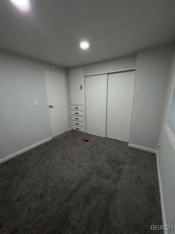 a bathroom with a sink toilet and mirror