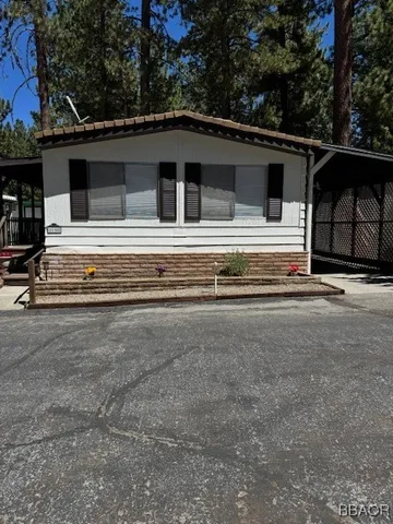 a side view of a house with garage