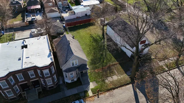 an aerial view of a house with garden