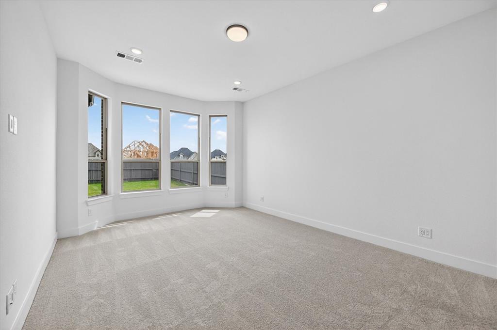 3776 Jane Street Venus, TX 76084 - Photo 12 of 25 wooden floor in an empty room with a window