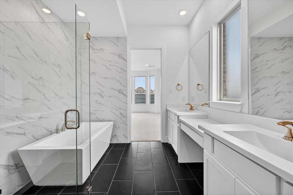 3776 Jane Street Venus, TX 76084 - Photo 14 of 25 a bathroom with a sink and a mirror