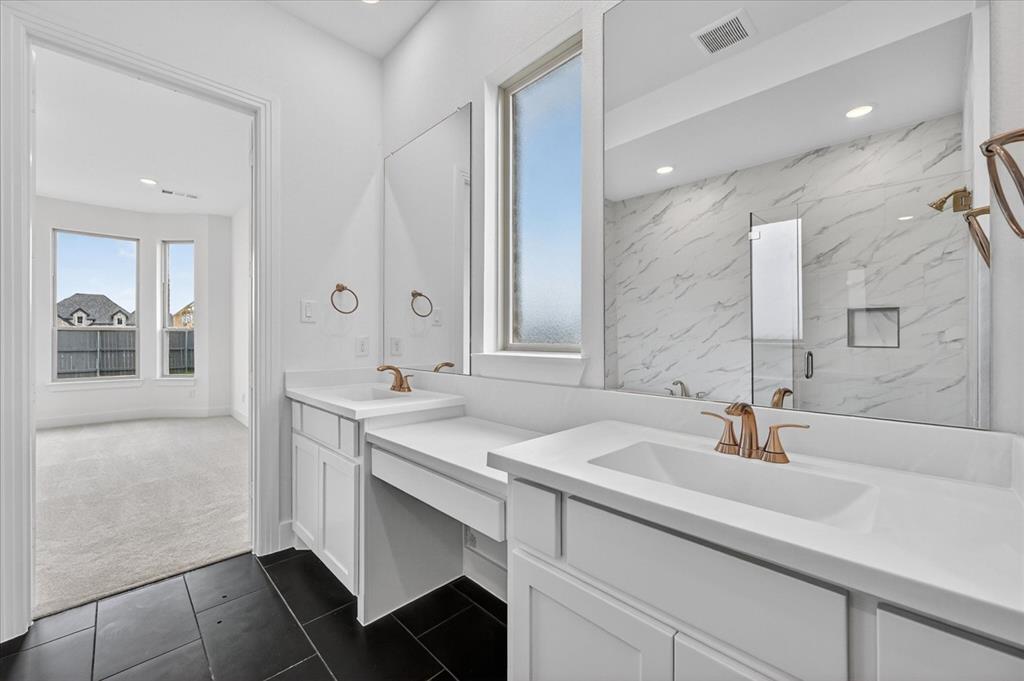 3776 Jane Street Venus, TX 76084 - Photo 15 of 25 a bathroom with a sink and a mirror