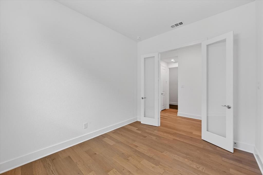 3776 Jane Street Venus, TX 76084 - Photo 20 of 25 a view of an empty room with wooden floor