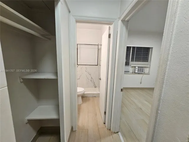 a view of a walk in closet