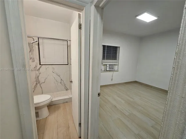 a view of bathroom with a toilet