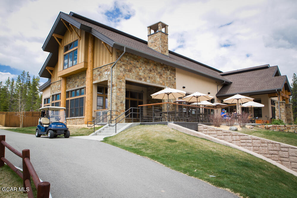 1346 Golf Course Circle Tabernash, CO 80478 - Photo 18 of 28 a front view of a building with garden