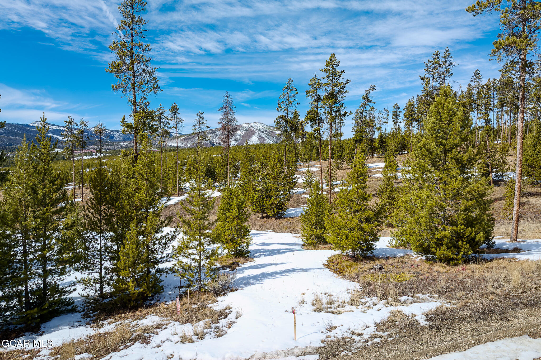 1346 Golf Course Circle Tabernash, CO 80478 - Photo 2 of 28 a view of a pathway both side of building