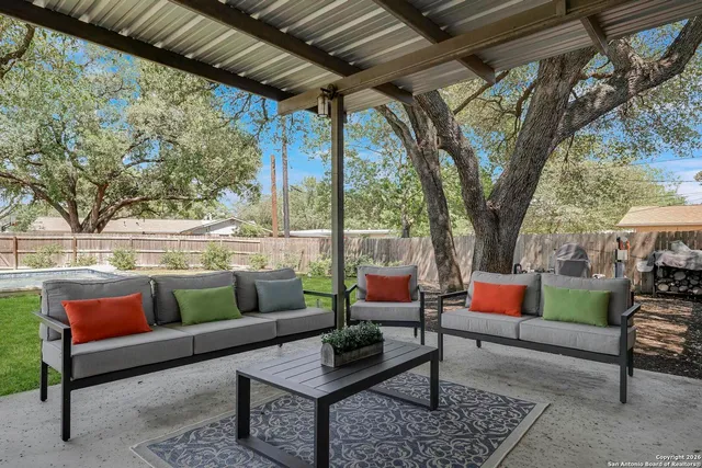 a outdoor living space with patio furniture and a potted plant