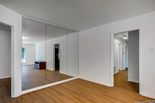 a view of a livingroom with wooden floor