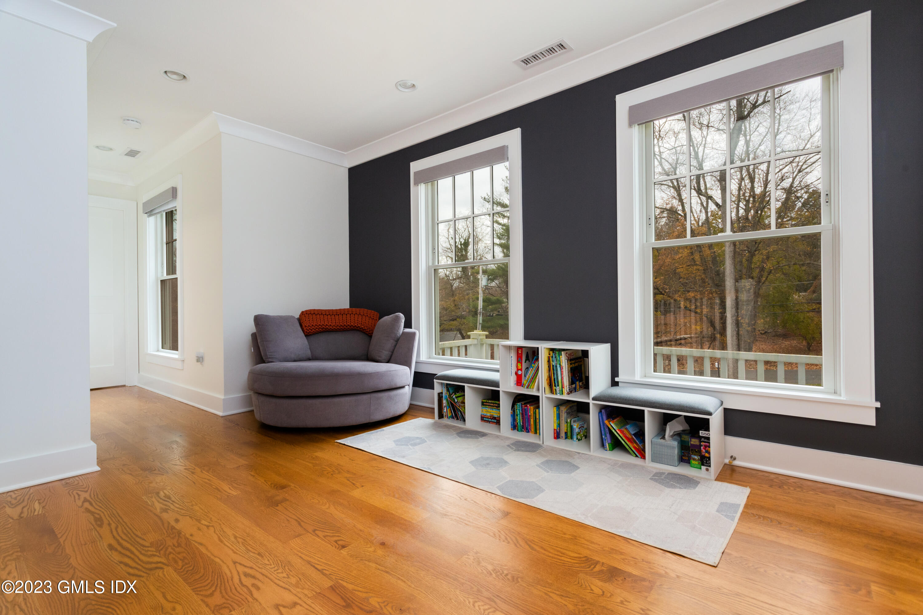 9 Cottontail Road Cos Cob, CT 06807 - Photo 15 of 33 a living room with furniture and a large window