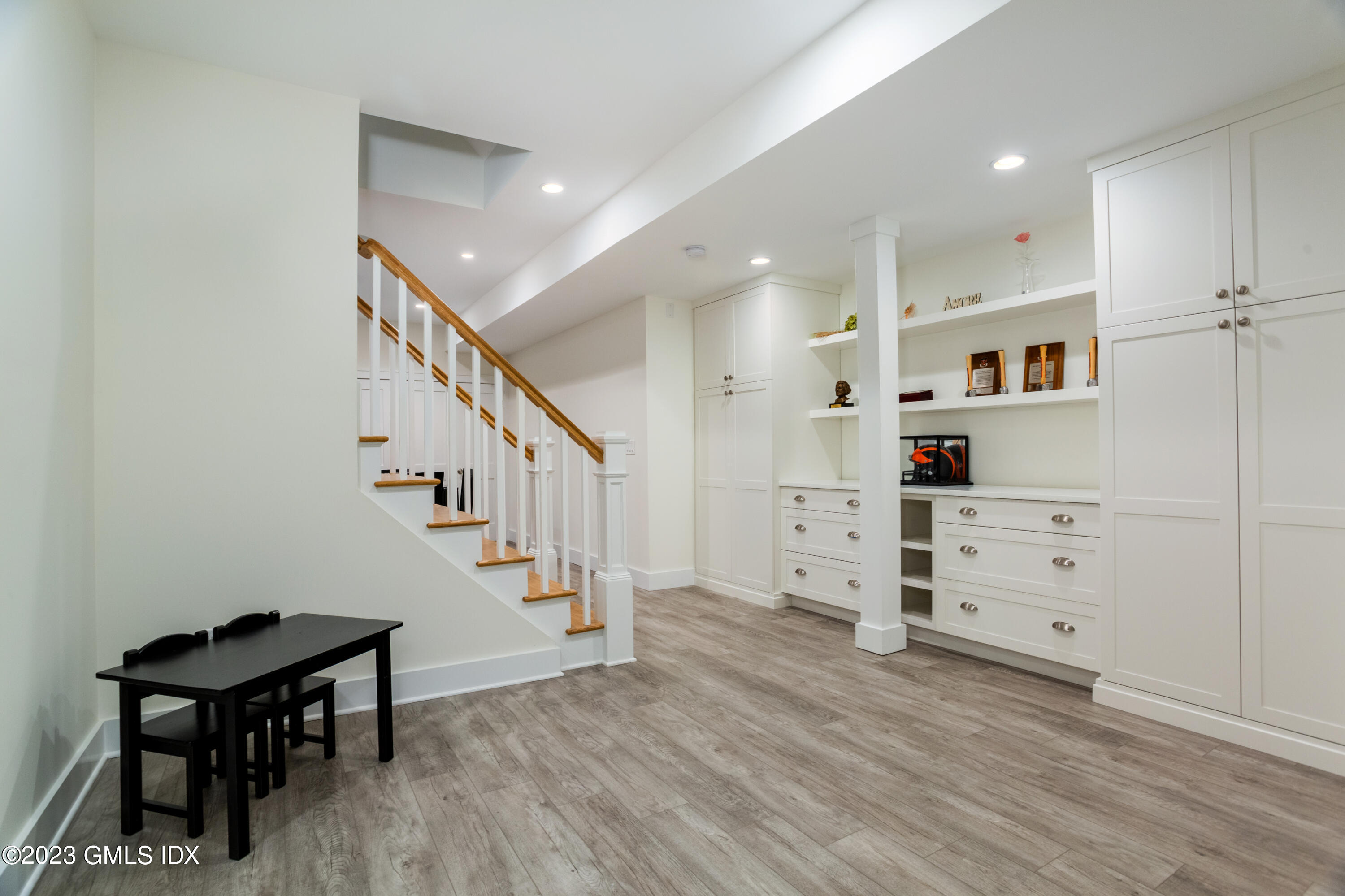 9 Cottontail Road Cos Cob, CT 06807 - Photo 20 of 33 a view of a hallway with cabinet and wooden floor