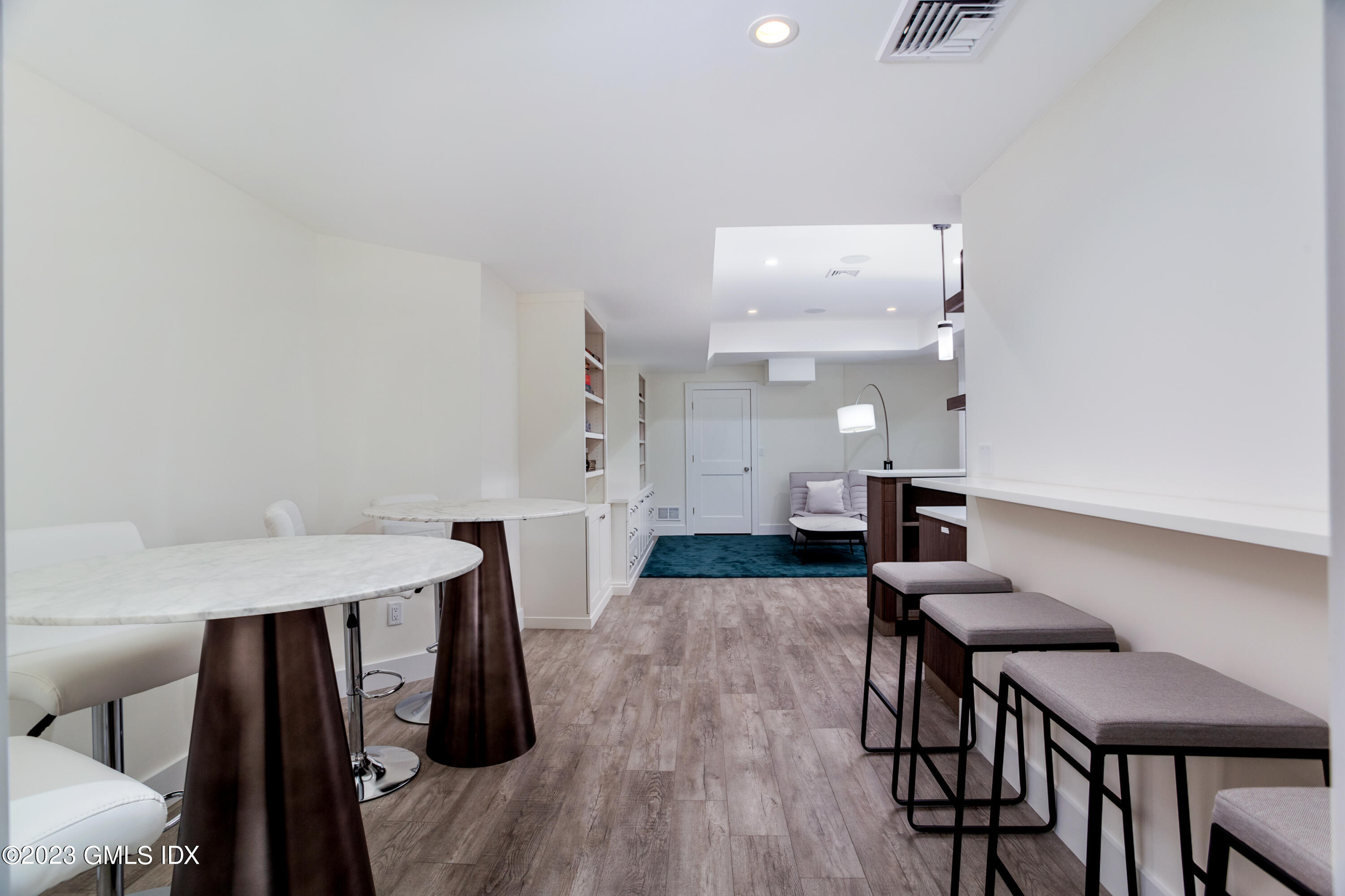 9 Cottontail Road Cos Cob, CT 06807 - Photo 25 of 33 a view of a dining room with furniture and wooden floor