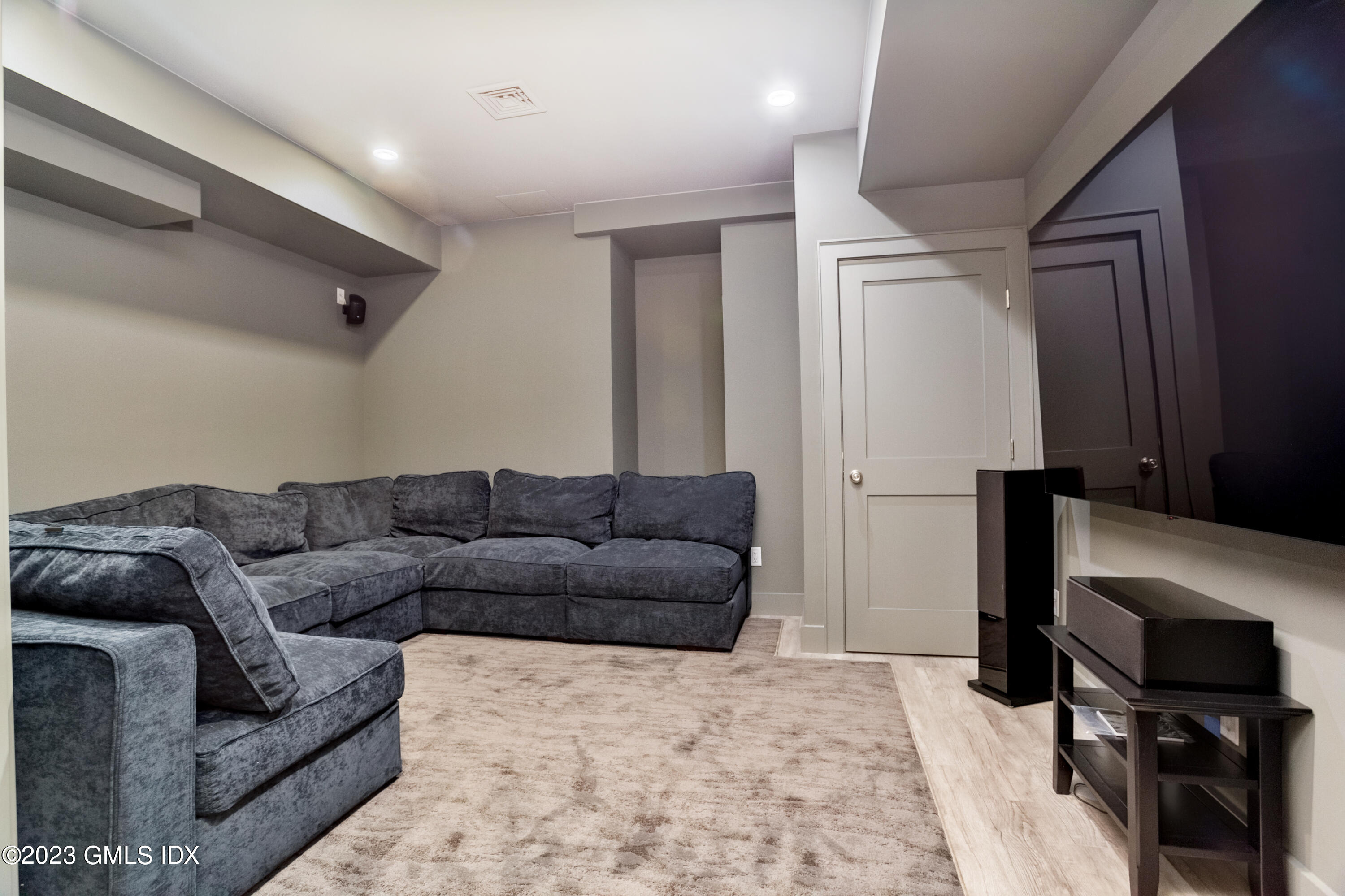 9 Cottontail Road Cos Cob, CT 06807 - Photo 26 of 33 a living room with furniture and a rug