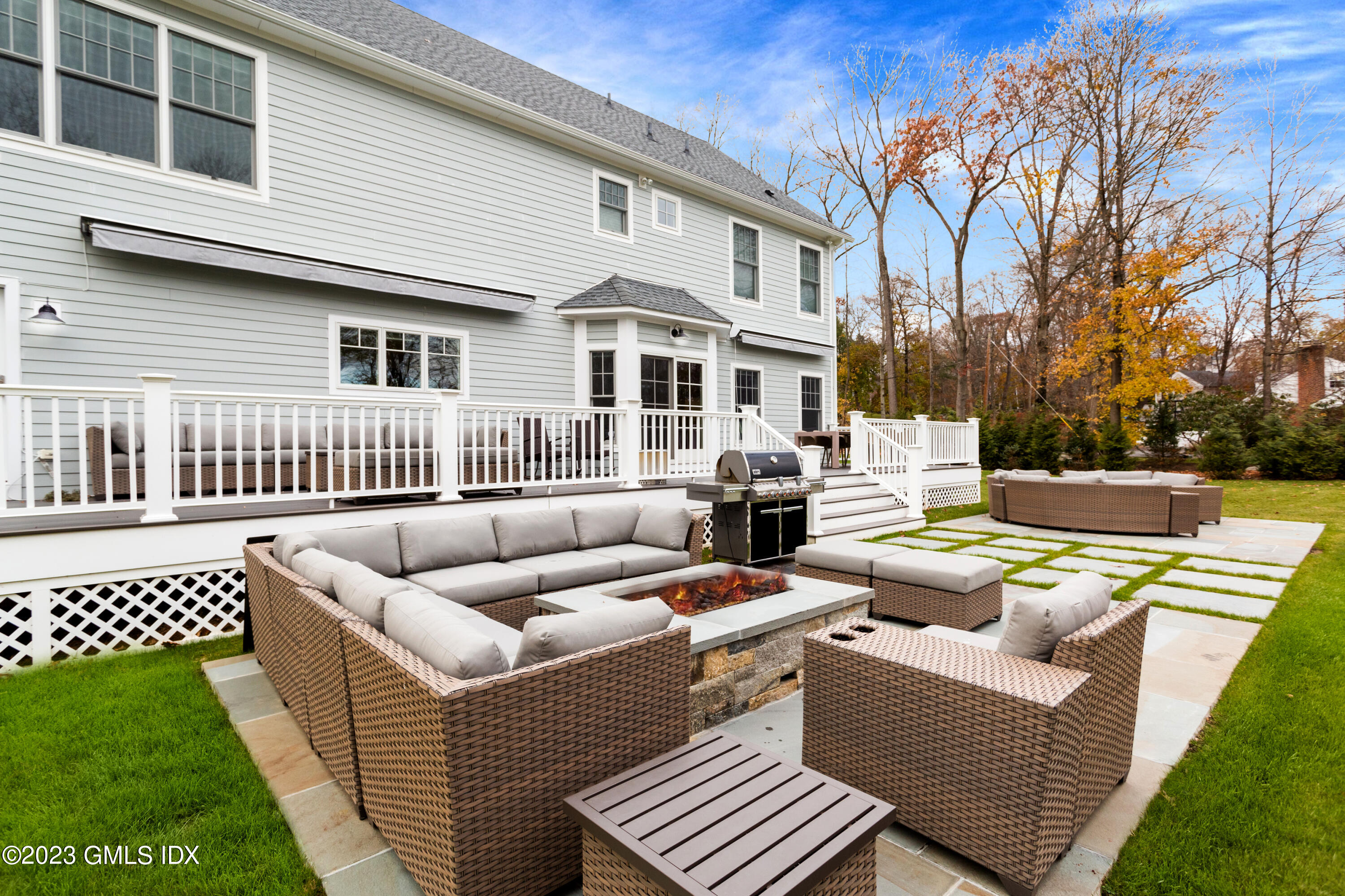9 Cottontail Road Cos Cob, CT 06807 - Photo 27 of 33 a view of a patio with couches chairs and wooden floor