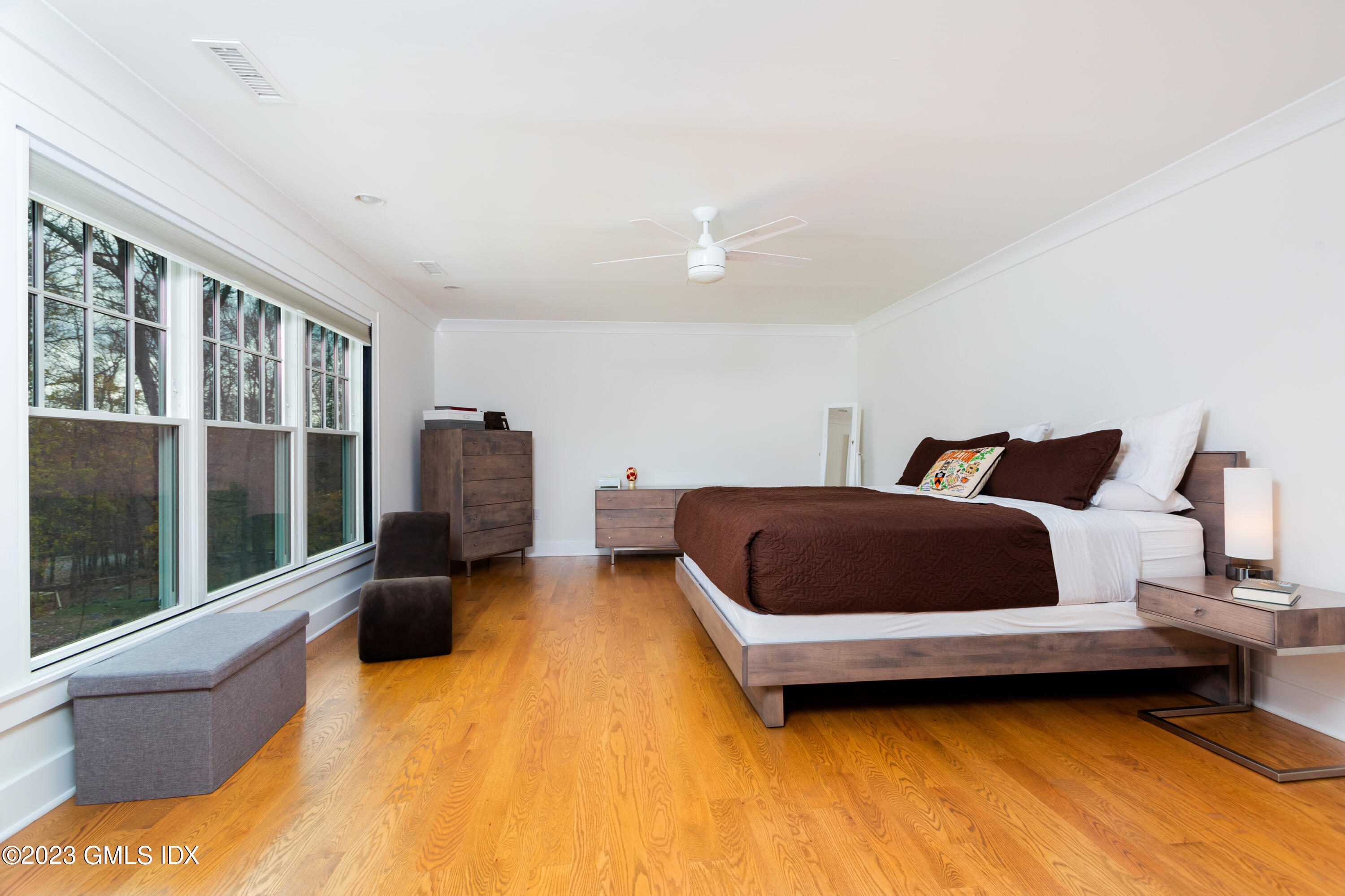 9 Cottontail Road Cos Cob, CT 06807 - Photo 10 of 33 a bedroom with a bed and wooden floor