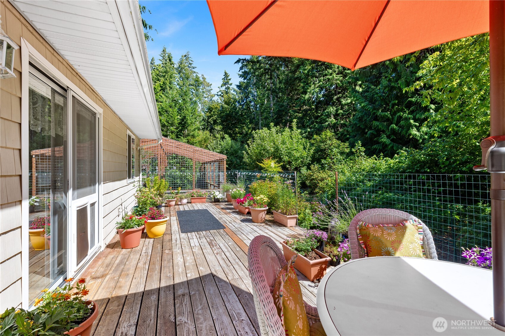 5505 Oyster Bay Road Northwest Olympia, WA 98502 - Photo 20 of 40 a outdoor view with a sitting space
